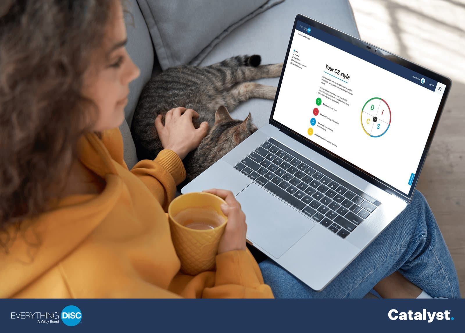 A person reading their DiSC style profile in Catalyst on a laptop