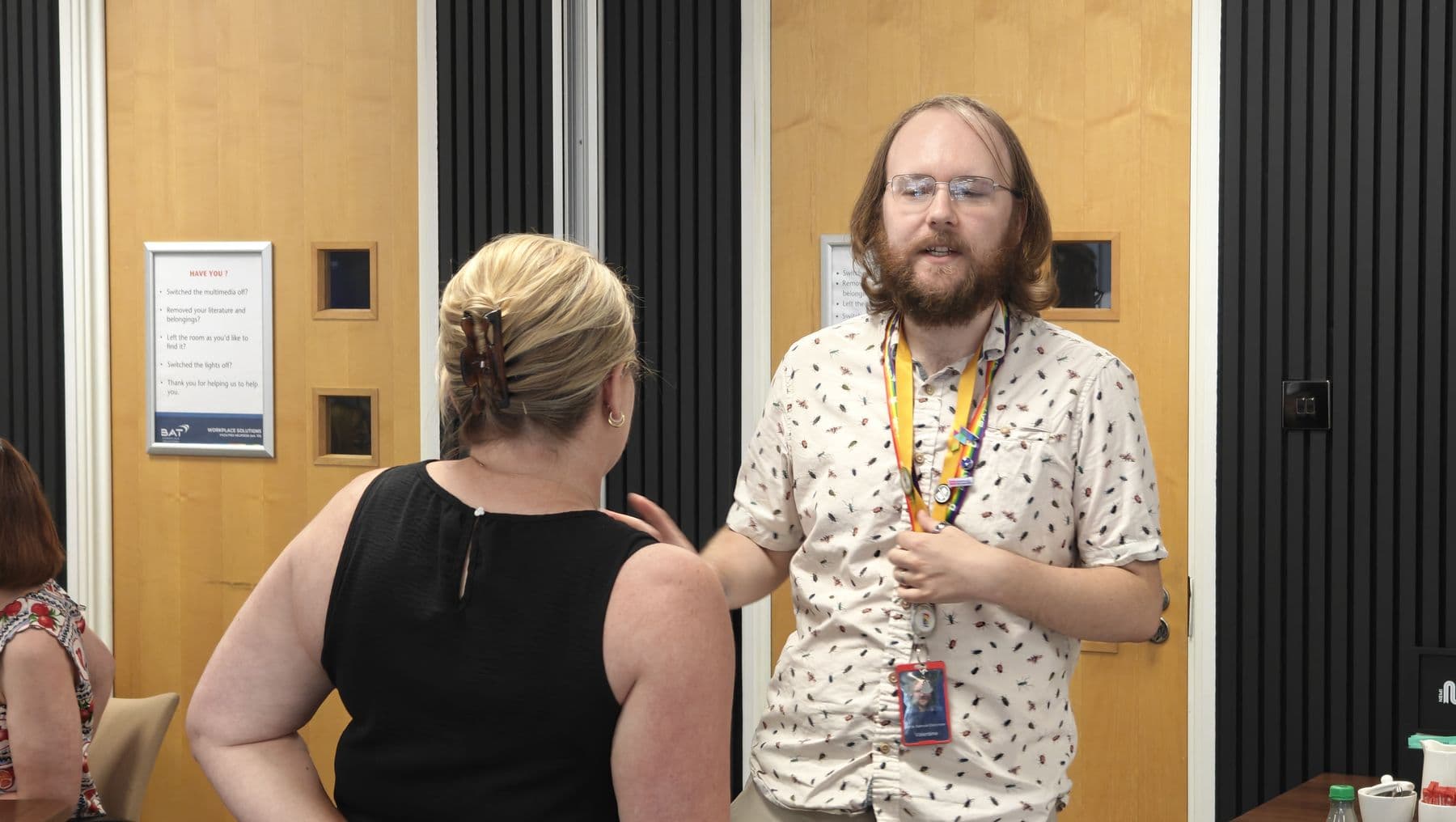 Two participants talking on their feet during a practice exercise
